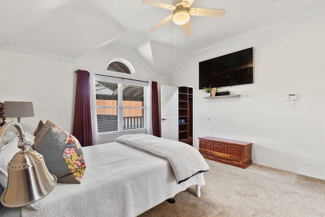 bedroom with crown molding, vaulted ceiling, and carpet flooring