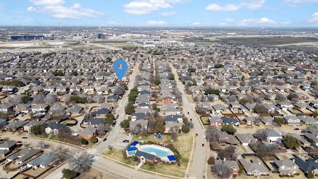 birds eye view of property with a residential view