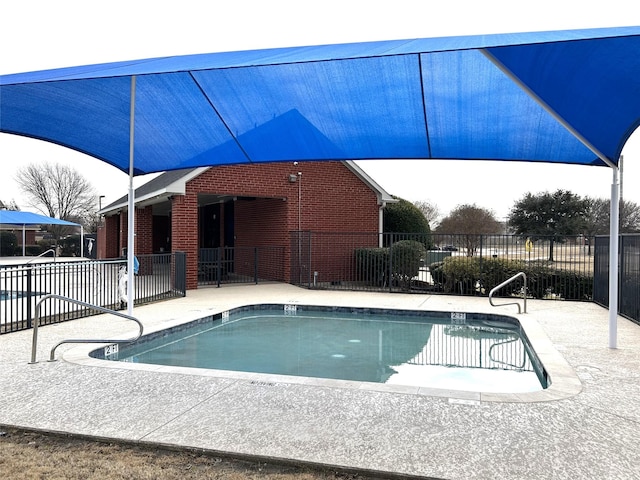 view of pool featuring a patio area