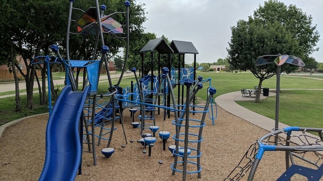 community play area with a lawn