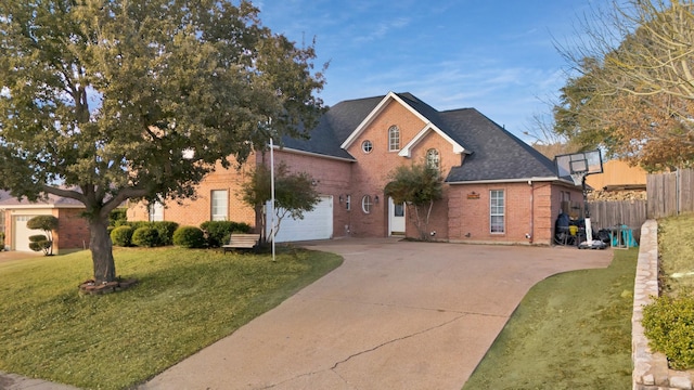 front of property with a garage and a front yard