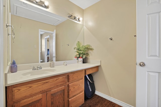 bathroom featuring vanity and wood-type flooring