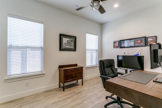 office featuring ceiling fan and light hardwood / wood-style floors