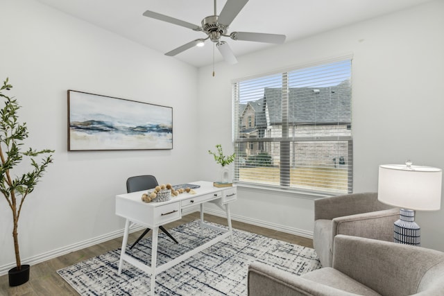 home office with hardwood / wood-style flooring and ceiling fan