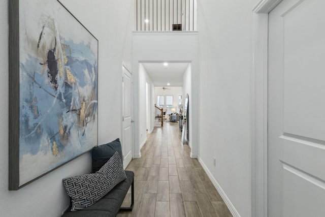 hallway with wood-type flooring