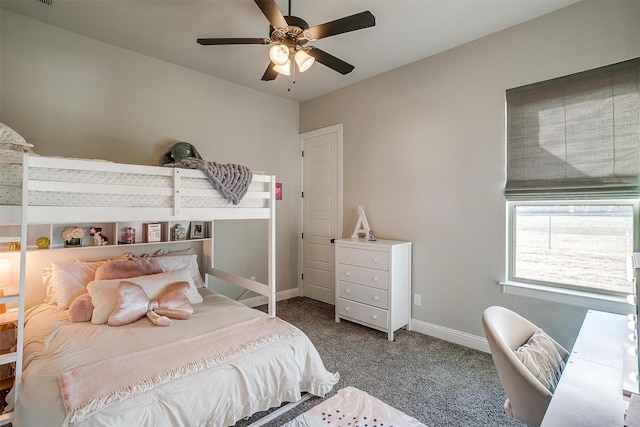 bedroom with ceiling fan and carpet