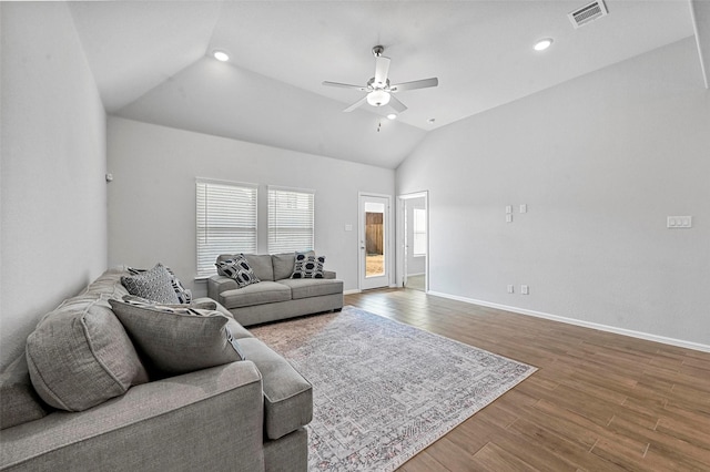 living room featuring lofted ceiling, wood-type flooring, and ceiling fan