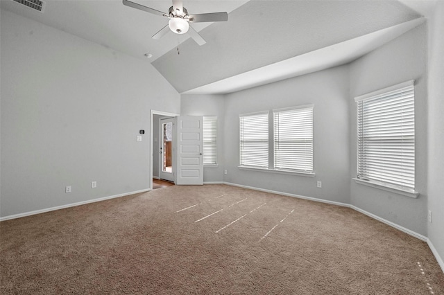 unfurnished bedroom with ceiling fan, lofted ceiling, and carpet floors