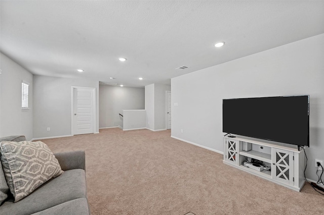 living room featuring light colored carpet