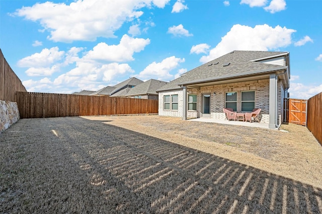 back of property with a patio area