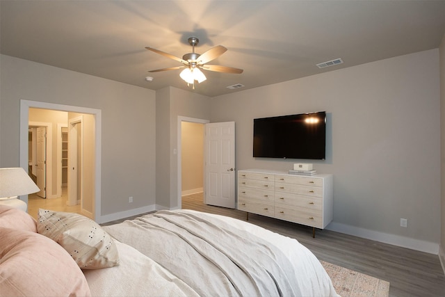 bedroom featuring ceiling fan and light hardwood / wood-style flooring