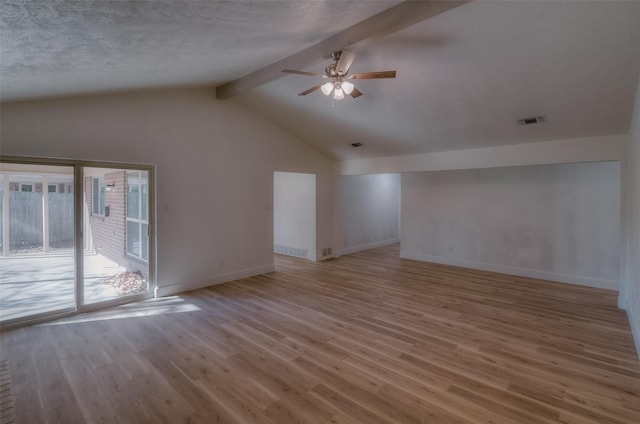 unfurnished living room with hardwood / wood-style flooring, ceiling fan, and vaulted ceiling with beams