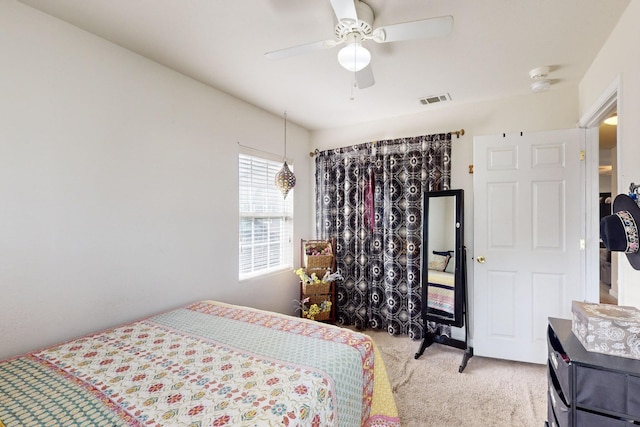 carpeted bedroom featuring ceiling fan