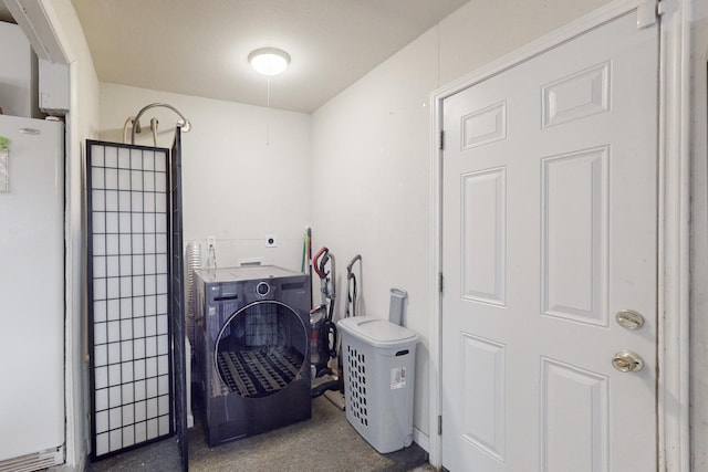 washroom with washer / clothes dryer