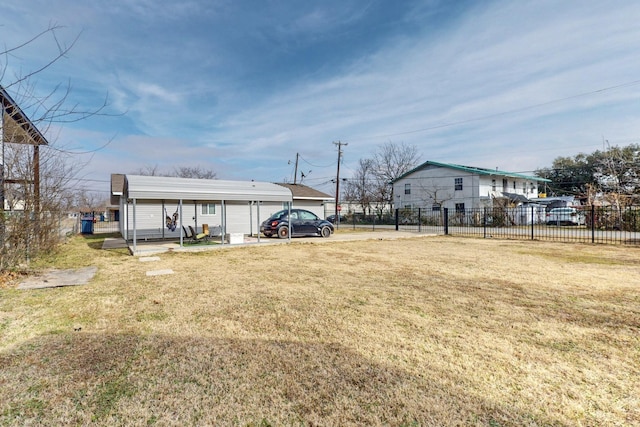 view of yard featuring a carport