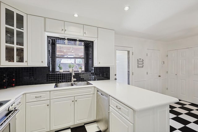 kitchen with white cabinetry, appliances with stainless steel finishes, and sink