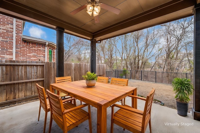 view of patio / terrace featuring ceiling fan