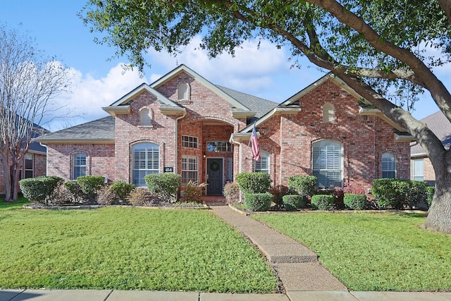 front facade with a front yard