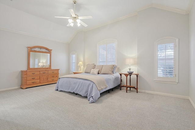 bedroom with crown molding, vaulted ceiling, ceiling fan, and carpet