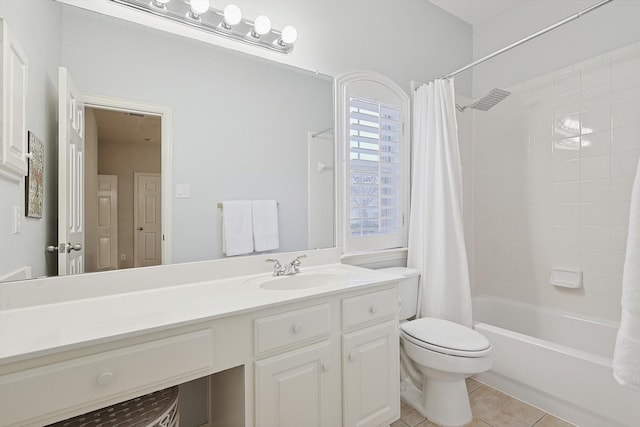 full bathroom with tile patterned flooring, vanity, shower / bath combination with curtain, and toilet