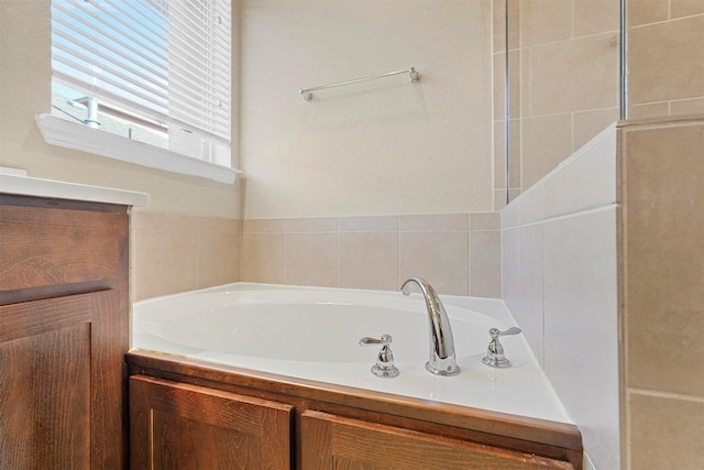 bathroom with a tub