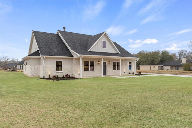 view of front of home with a front yard