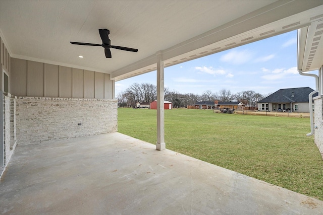 view of patio featuring ceiling fan