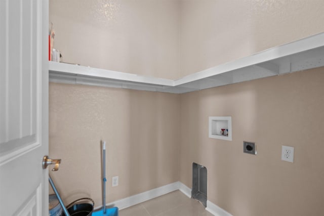 laundry area with light tile patterned floors, baseboards, laundry area, electric dryer hookup, and hookup for a washing machine