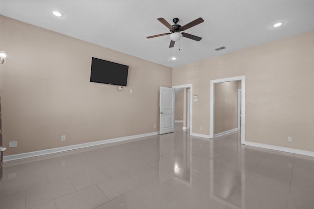 tiled spare room with visible vents, baseboards, a ceiling fan, and recessed lighting
