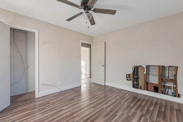 unfurnished bedroom with wood-type flooring and ceiling fan