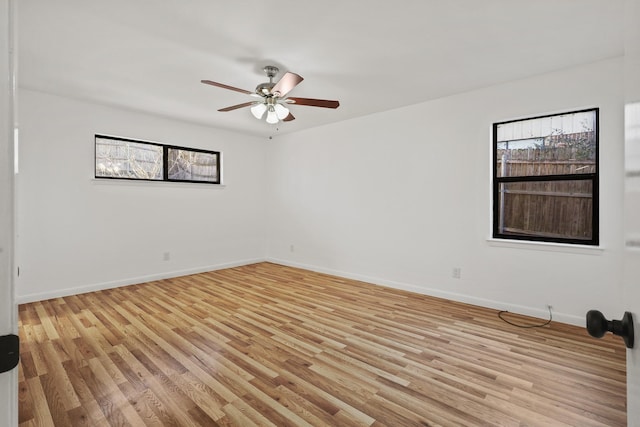 unfurnished room featuring ceiling fan and light hardwood / wood-style flooring