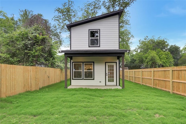 view of outbuilding featuring a yard