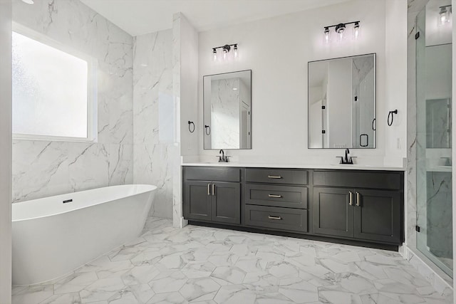 bathroom with vanity, tile walls, and separate shower and tub