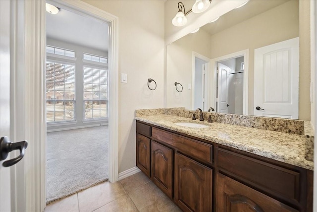 bathroom with vanity and tile patterned floors