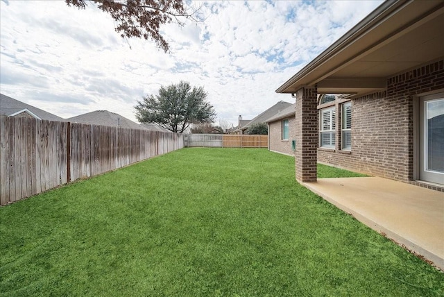 view of yard with a patio area