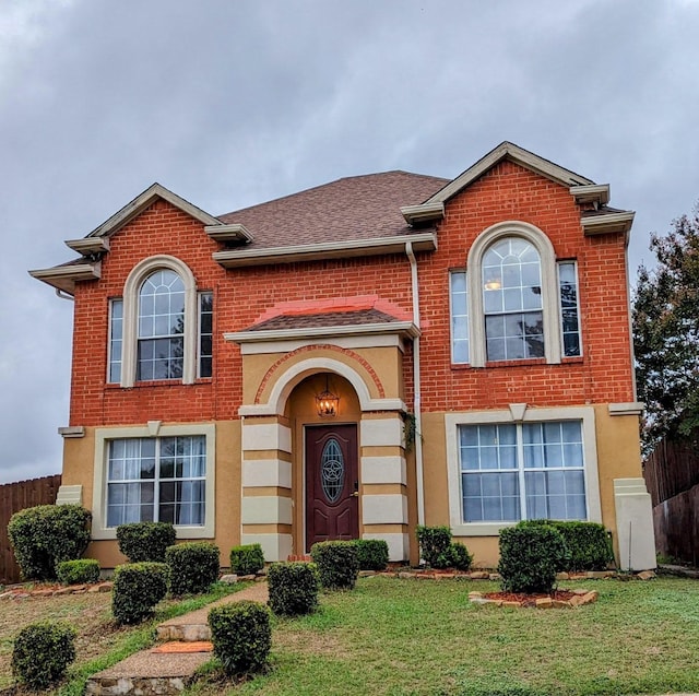 view of front of house with a front lawn