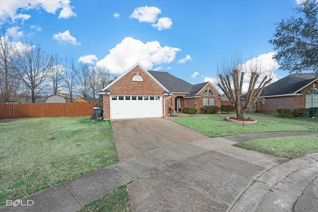 view of front of property with a garage and a front lawn