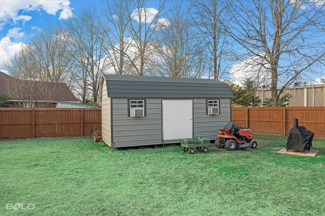 view of outbuilding with a lawn