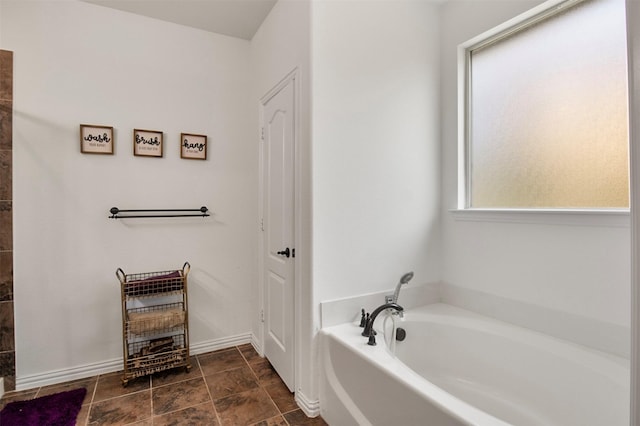 bathroom with a washtub