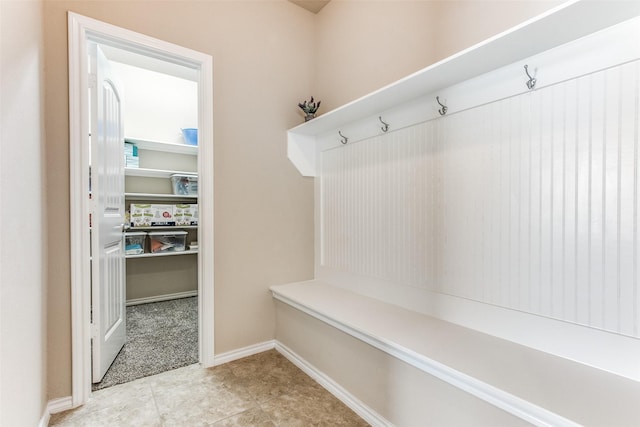 mudroom featuring baseboards