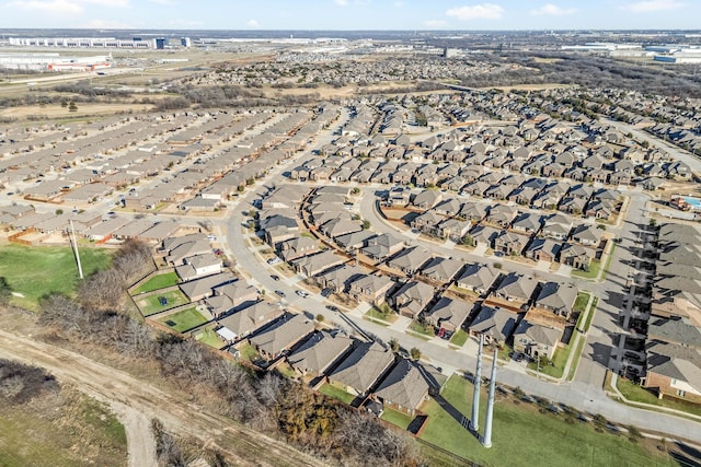 birds eye view of property with a residential view