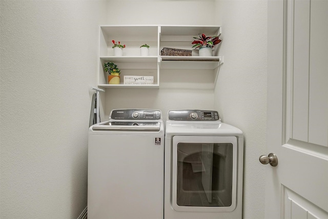 laundry room with washer and dryer