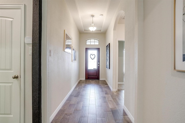 doorway featuring hardwood / wood-style flooring