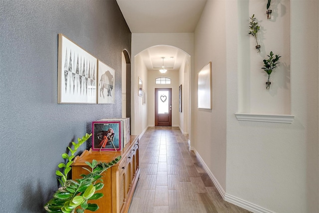 entryway with light hardwood / wood-style flooring