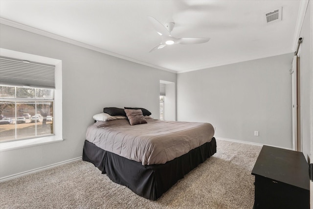 bedroom featuring carpet floors, ornamental molding, and ceiling fan