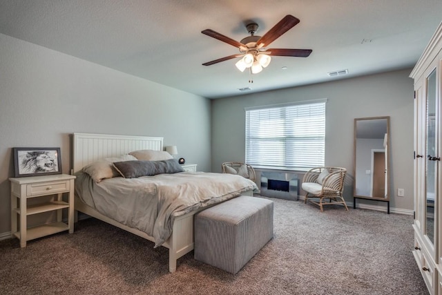 bedroom featuring ceiling fan and carpet floors