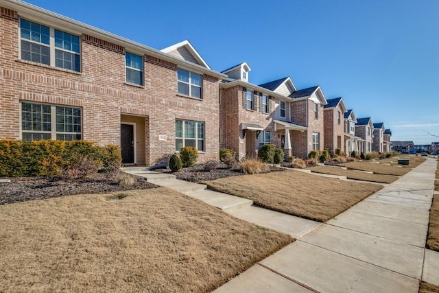 exterior space with a front lawn