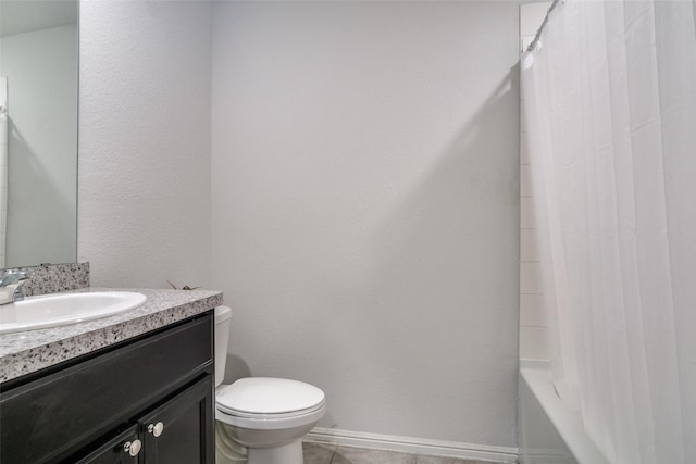 full bathroom with tile patterned flooring, vanity, shower / tub combo, and toilet