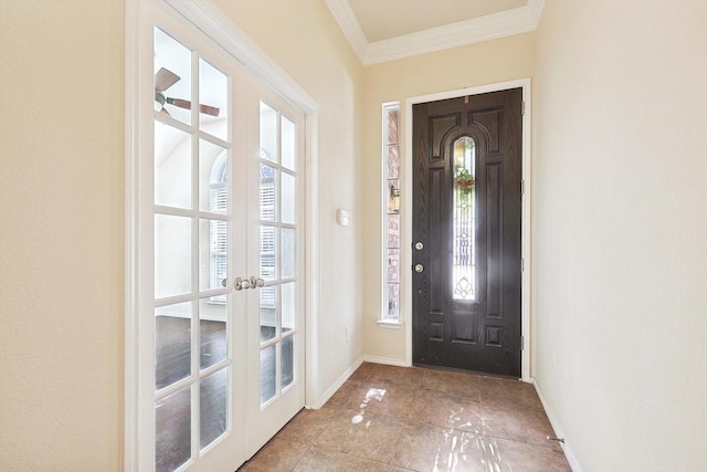 entryway featuring ornamental molding, french doors, and a healthy amount of sunlight