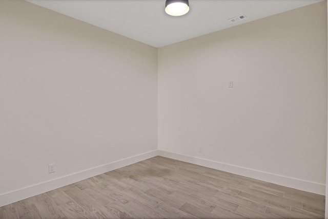 empty room featuring light hardwood / wood-style floors